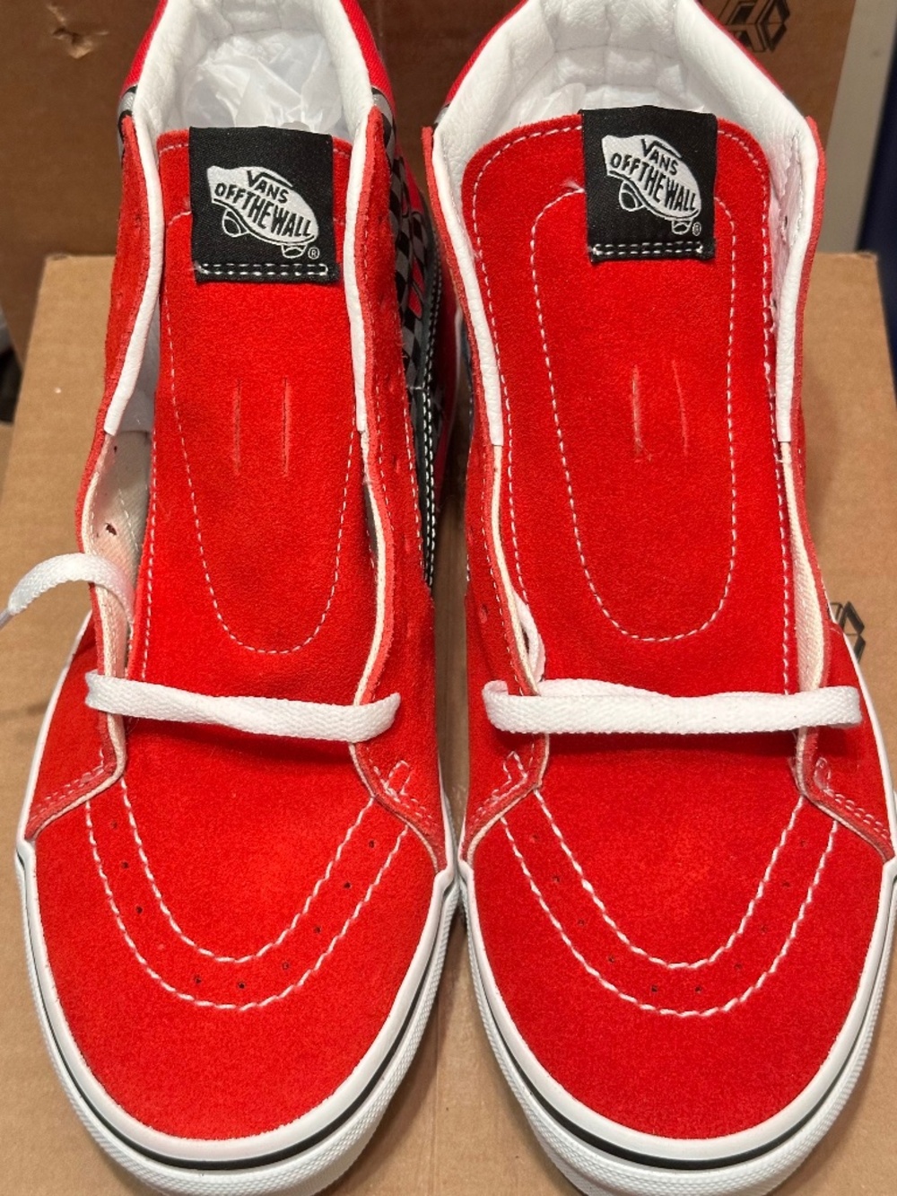 Vans Sk8-Hi Reflect Check Flame Racing sneakers featuring a bright red suede upp